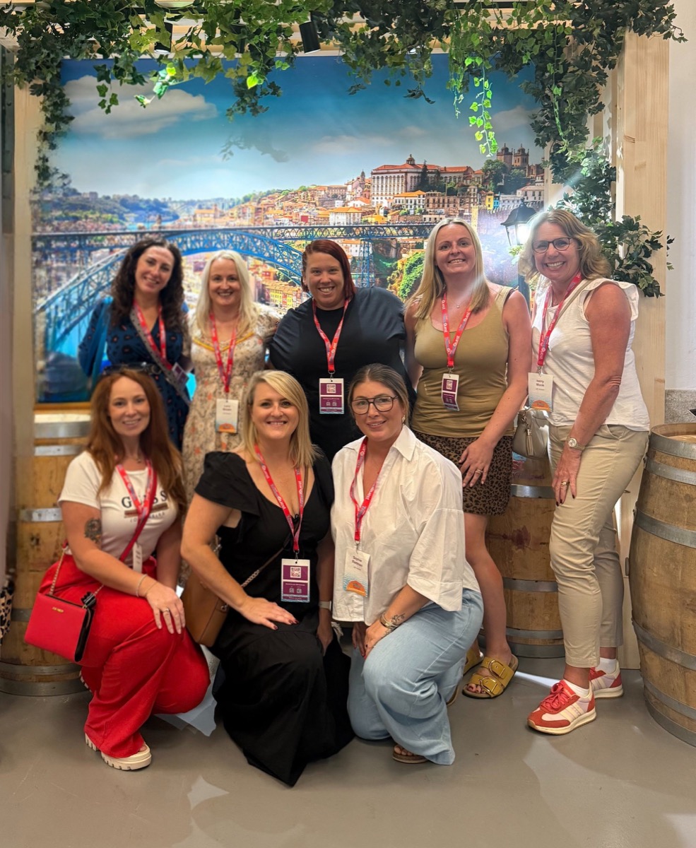 Unlocked community members together at a travel event
